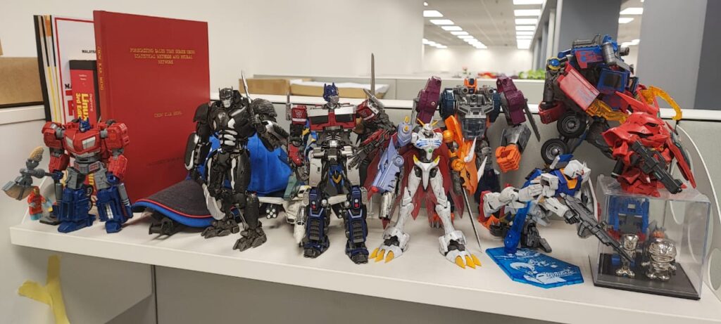 Collections of hobby action figures and models on shelve